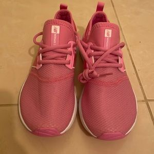 New balance pink sneakers. Never worn. Wrong size for me. Size 6